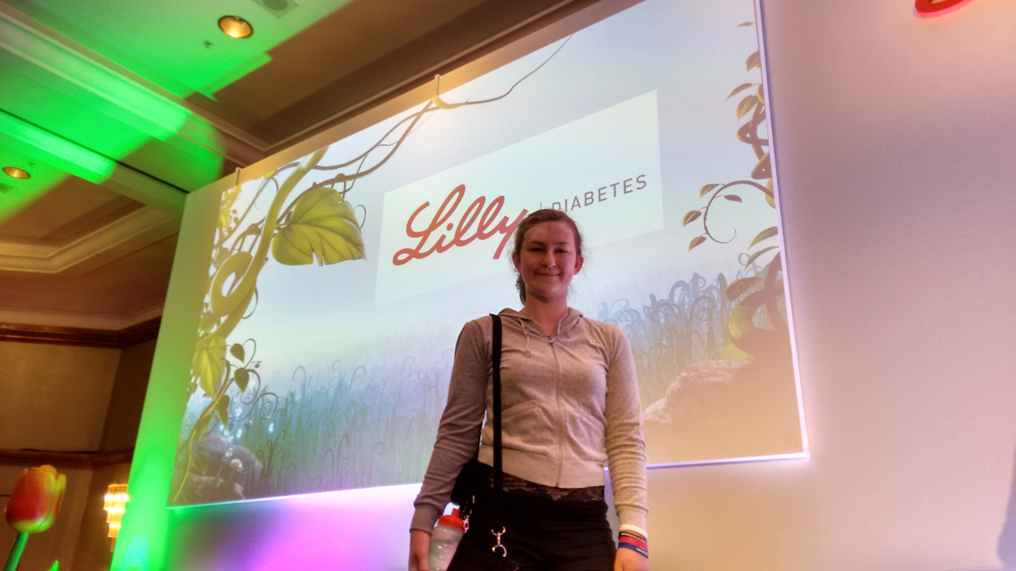 Amy on stage at the Lilly National Paediatric Team Meeting